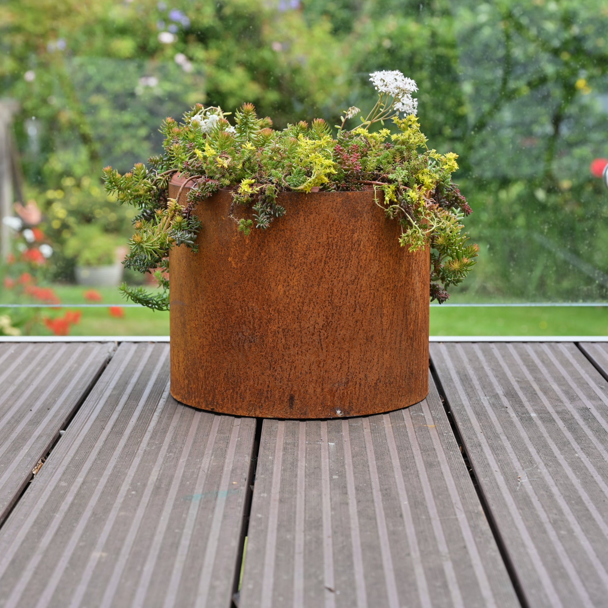 Rusty metal plant pot from SavageWorksUK, a 5L garden planter with a weathered, rustic finish for outdoor gardening.