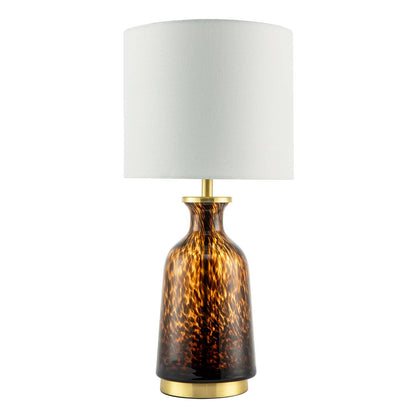 Modern amber and black snowflake speckle glass table lamp with shade, showcasing a stylish design and decorative base.
