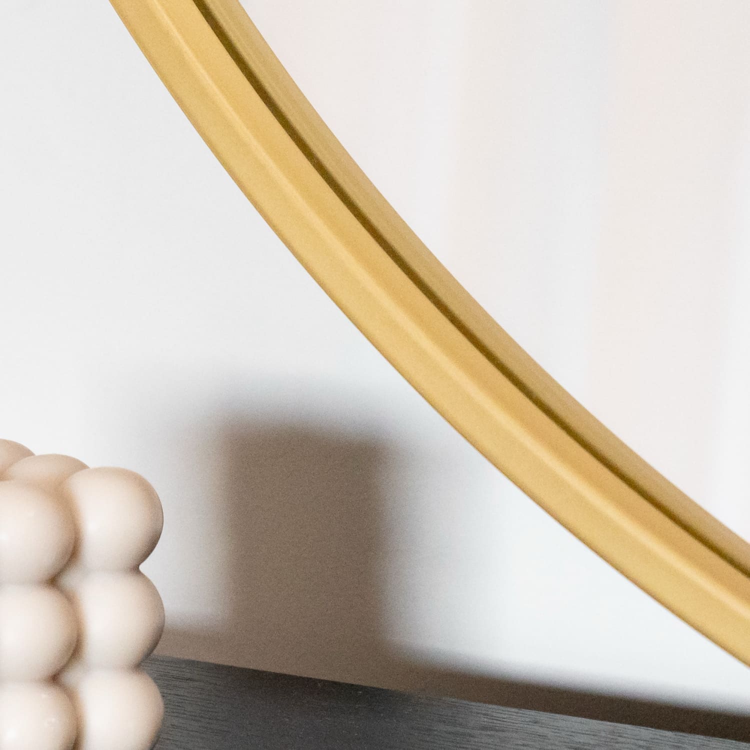 Jōbū Home Rei round gold metal circle mirror, 70cm x 70cm, with a sleek gold frame and reflective glass surface.