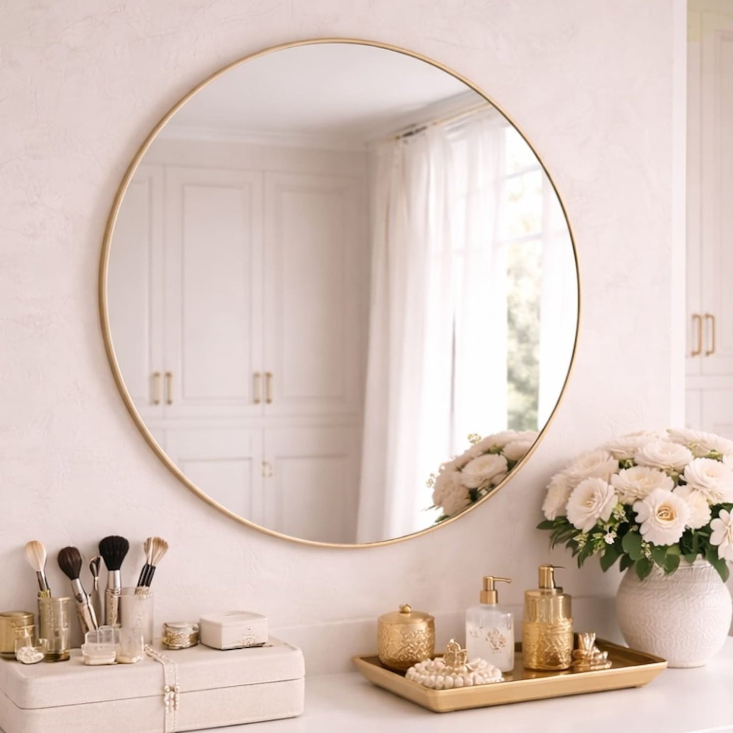 Round gold metal circle mirror by Jōbū Home, 70cm x 70cm with a sleek frame, perfect for modern interior decor.