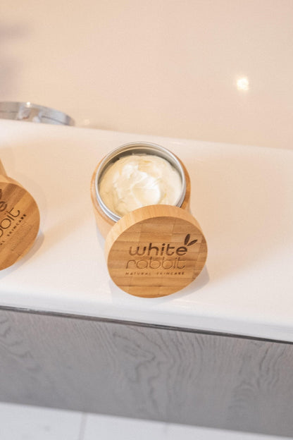 White Rabbit Skin Care Rose and Orange Rejuvenating Night Cream moisturizer in a 100ml jar, featuring rose and orange ingredients for skin renewal.
