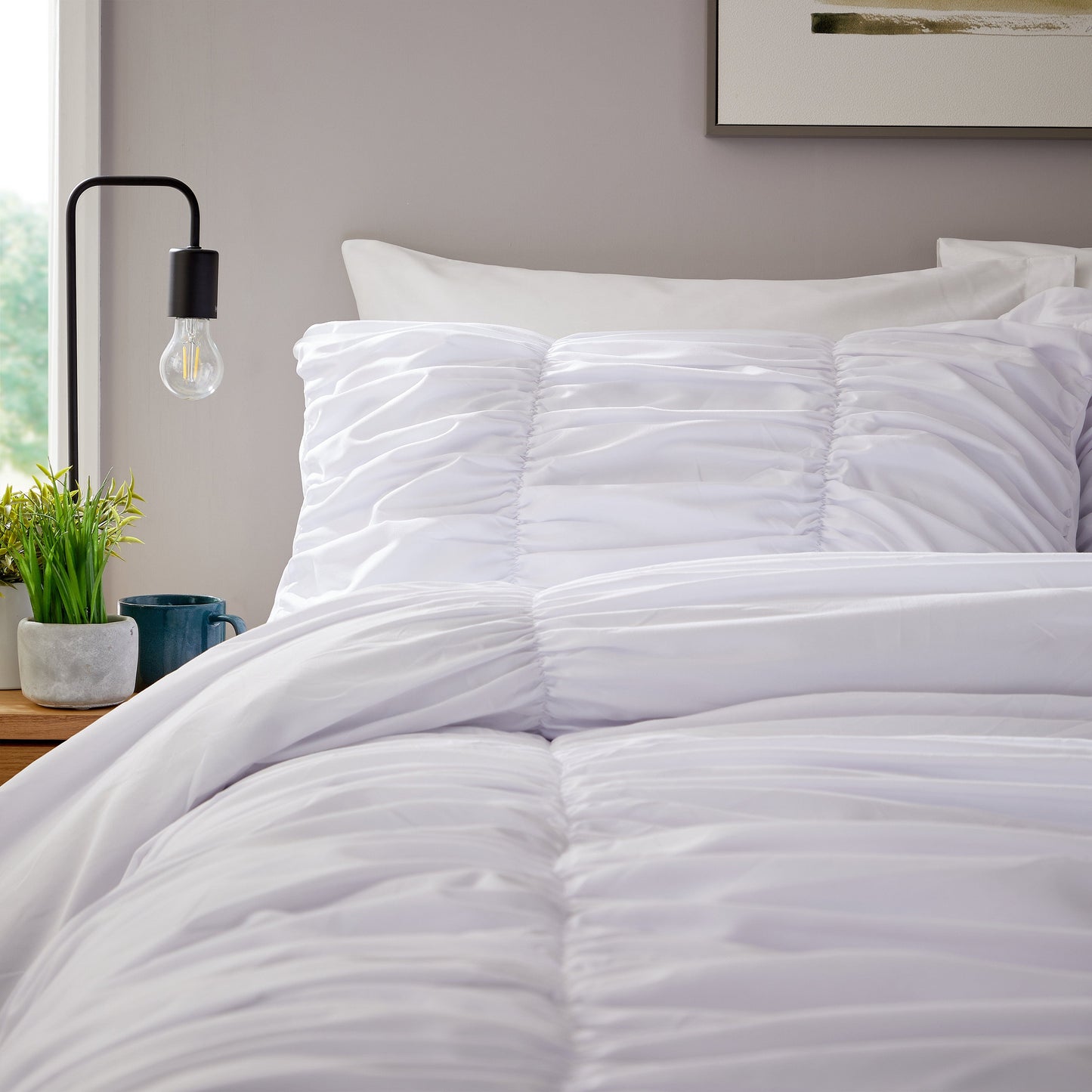 OLIVIA ROCCO white ruched microfibre duvet cover set with matching pillowcases, soft and easy-care ruffle bedding for modern bedrooms.