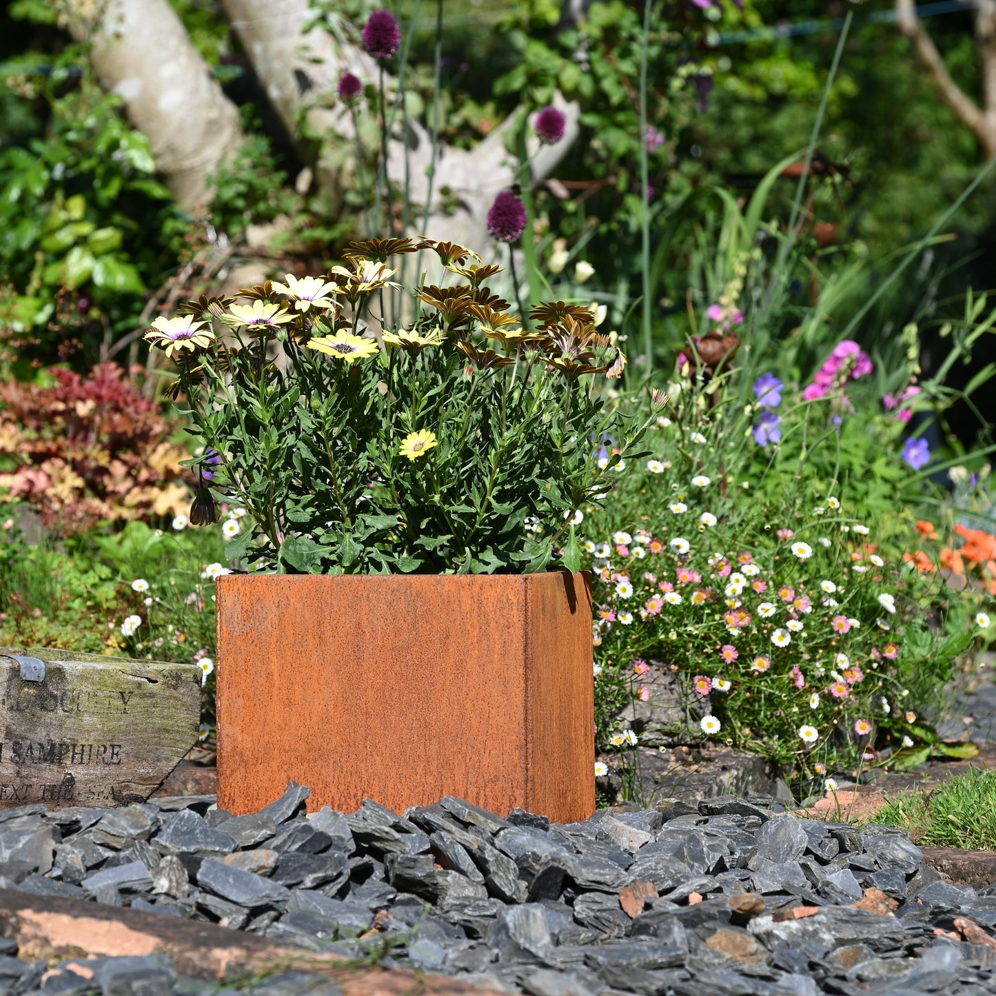 Rusty square metal plant pot by savageworksuk, showcasing a weathered, industrial design for indoor or outdoor plants