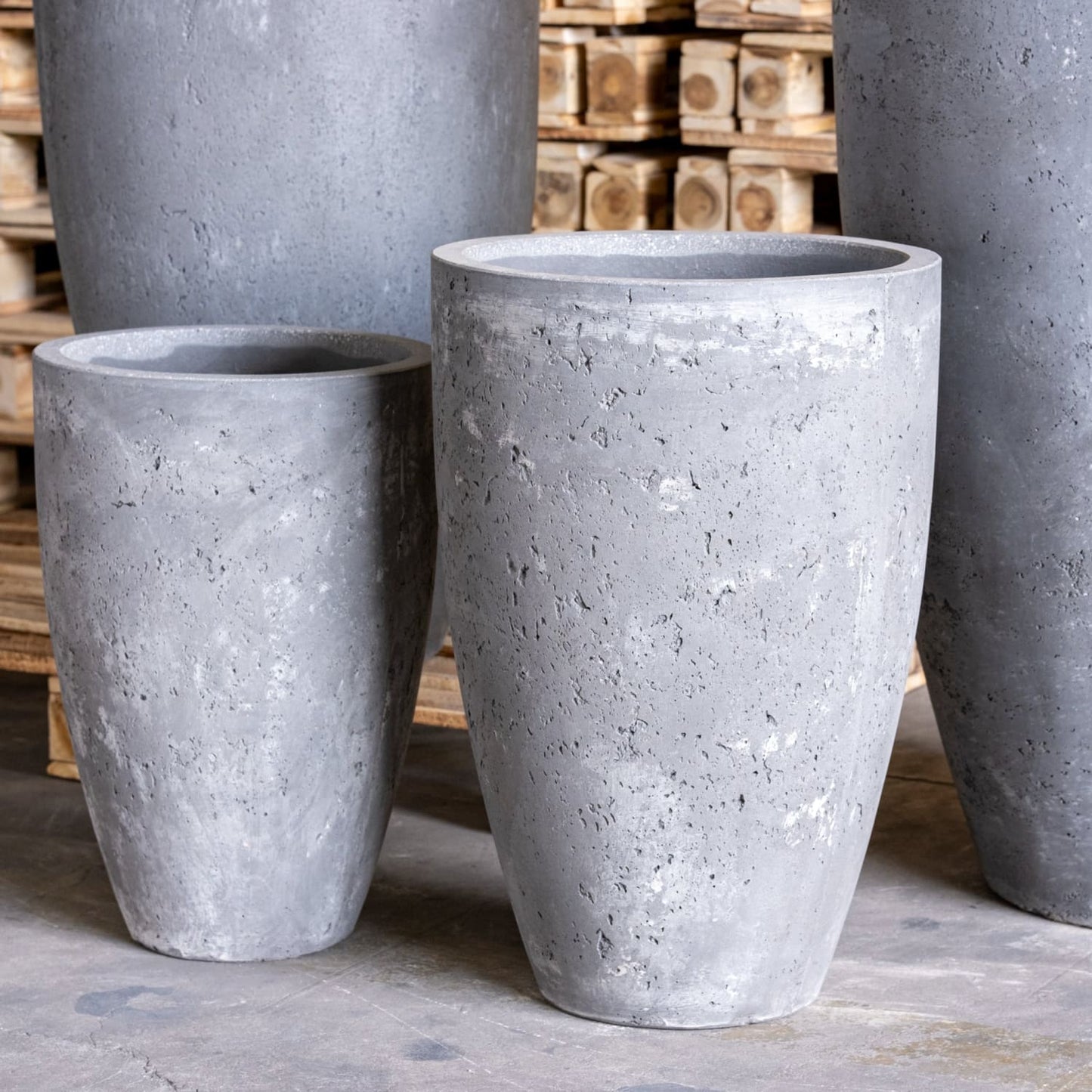 Large Vessara Onyx Dusk concrete vase planter by Jōbū Home, 52cm tall indoor outdoor pot with a sleek, dark finish.