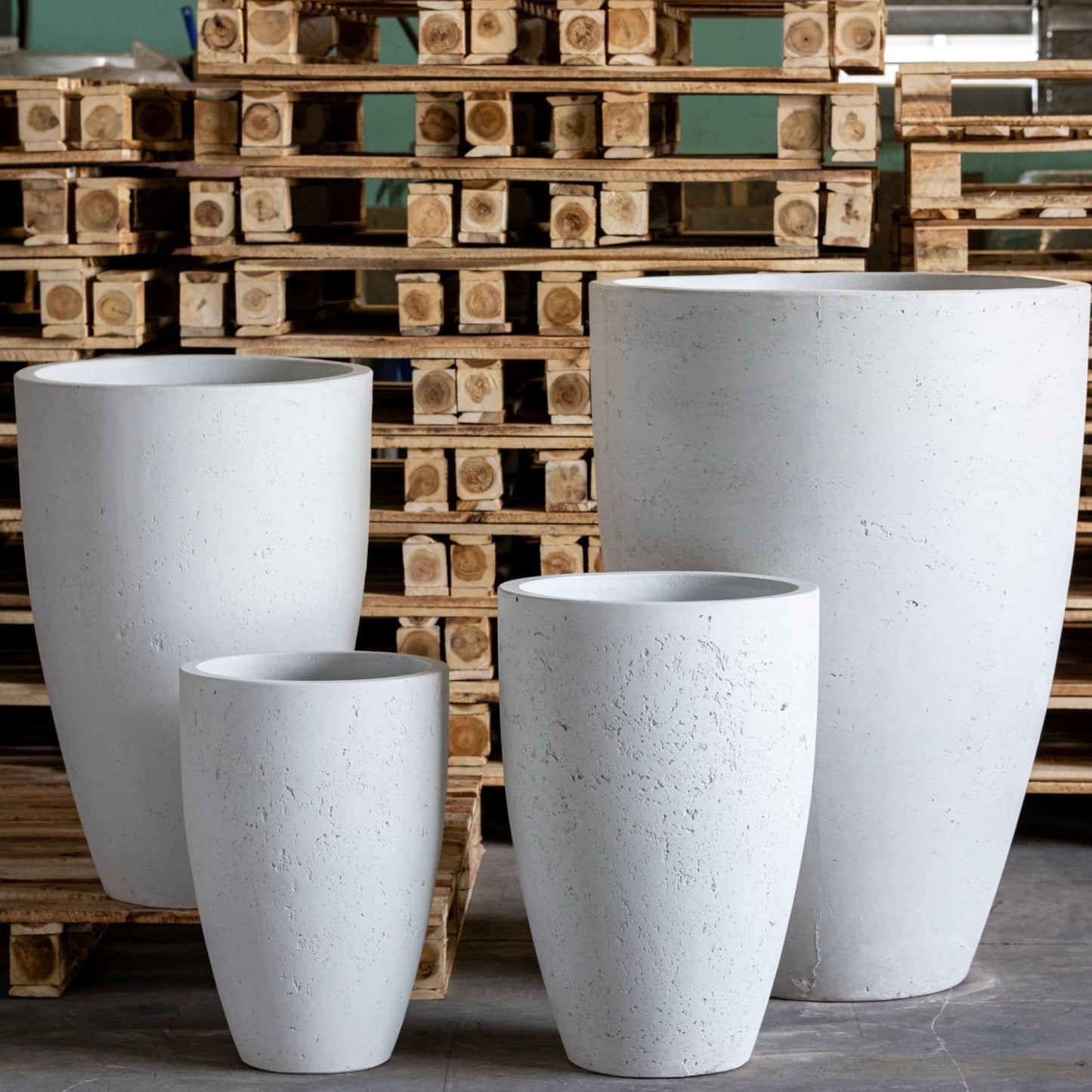 Large white concrete planter by Jōbū Home, Vessara White Mist, 62cm tall, vase-style outdoor plant pot for lush greenery.