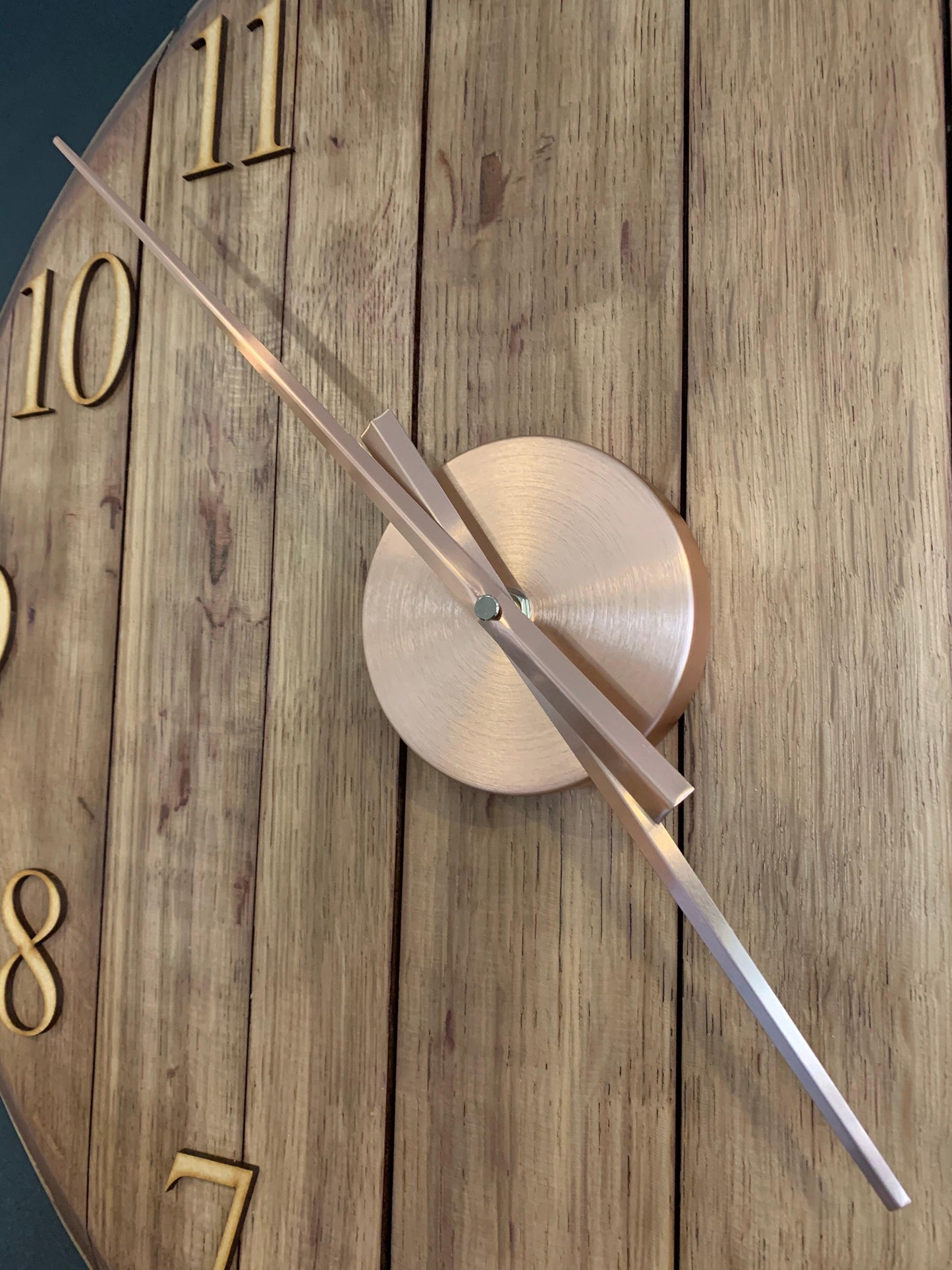 Oak finish whiskey barrel clock by MooBoo Home, made to order, featuring rustic wood grain and vintage design.